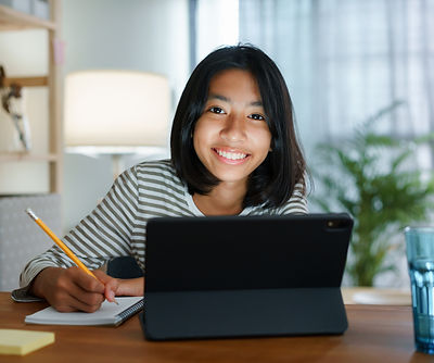 Girl learning on tablet