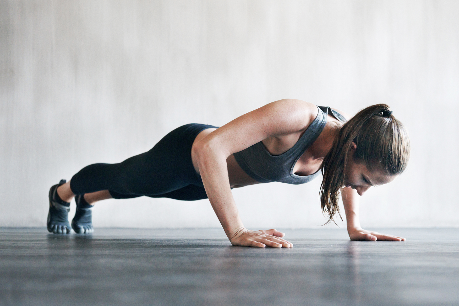 A woman doing push ups