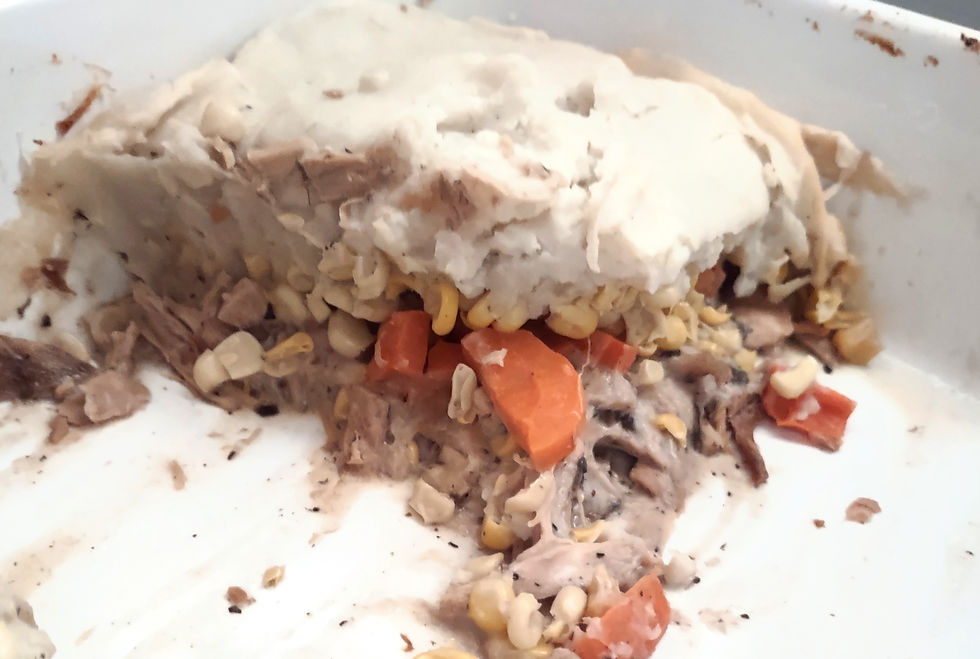 Rabbit shepherds pie with rabbit, cream if mushroom soup, carrots, corn and mashed potatoes