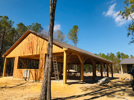 New Construction Design build Commercial building that is a pavilion built for a brewery. Metal roof, open shelter, Vaulted ceiling, cedar post, cedar trusses, knotty pine ceiling, stage area. 