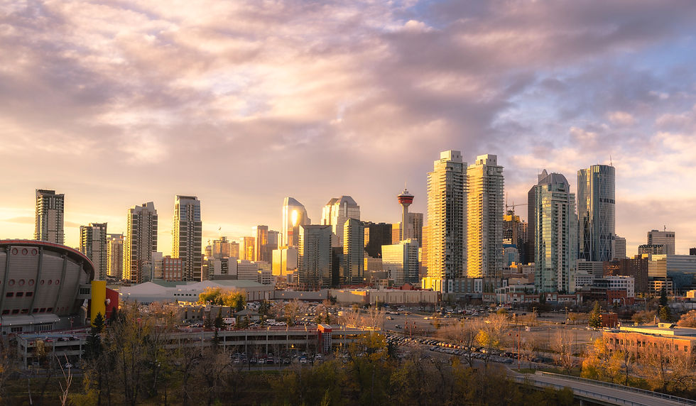 calgary-cityscape-lit-up-at-dawn-2026-03-25-00-50-25-utc.jpg