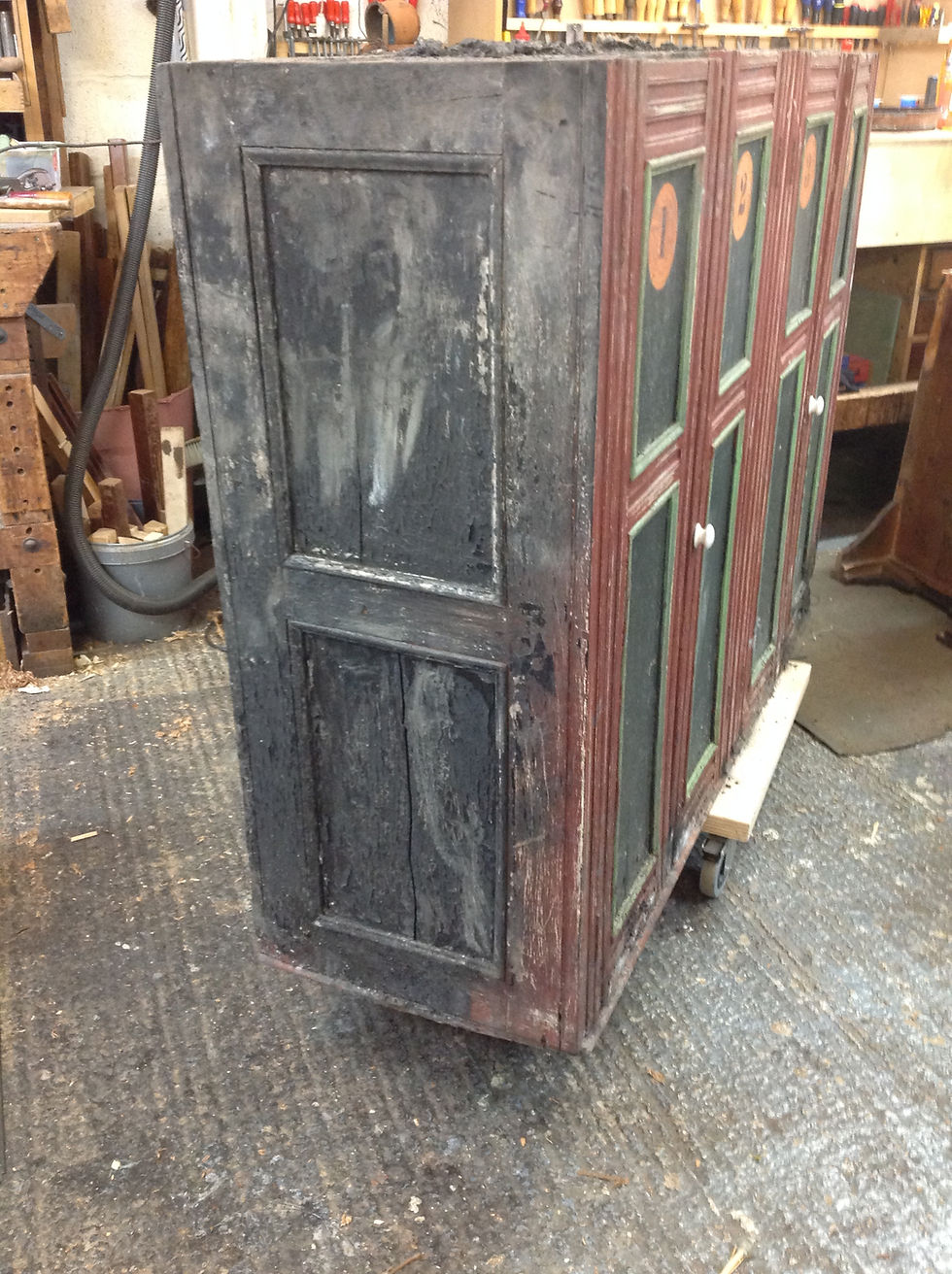 Before painted furniture repairs on a kitchen cabinet.