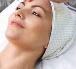 Women having natural facelift massage