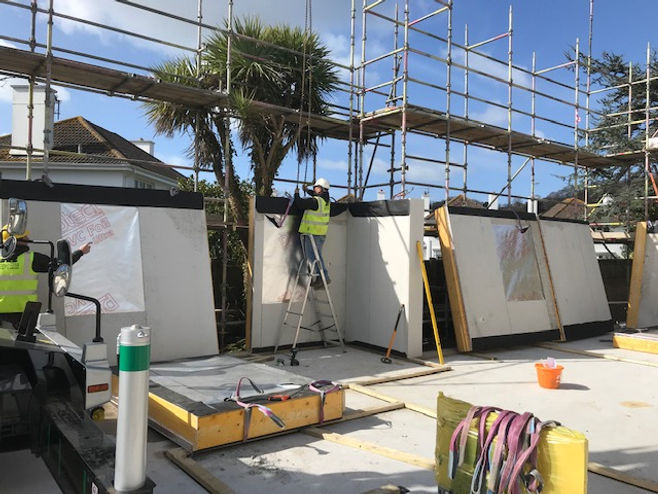 Wall panels being placed for an Advanced Foundation Systems build