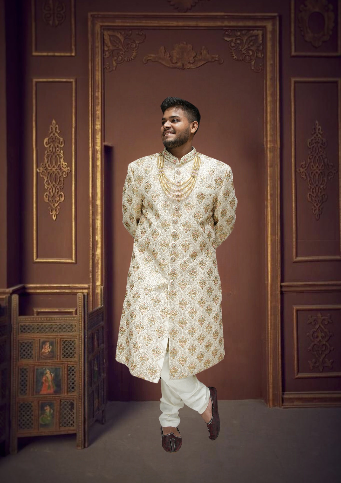 Hand Embroidery in elegant copper on a cream Sherwani
