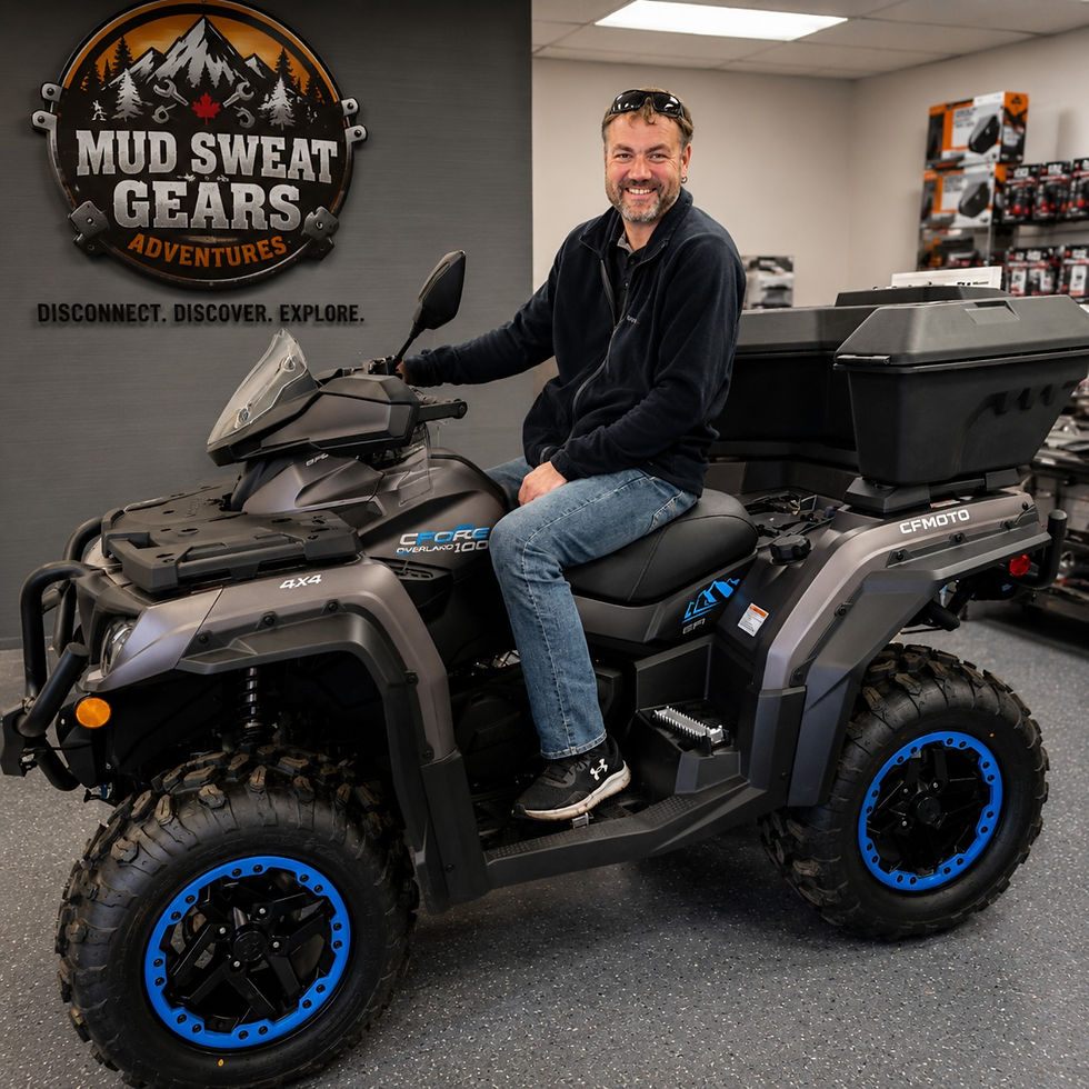 a man sitting on an atv smiling