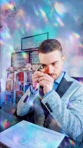 Dimitri Zlatev Looking at an Asscher cut Diamond