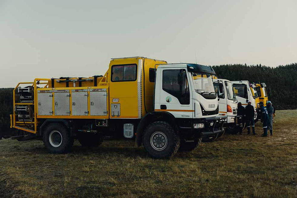 Row of MTO-branded fire trucks parked at the annual Fire Competition