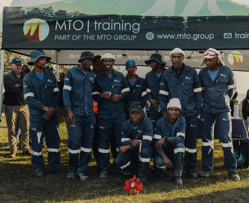MTO Longmore team celebrating third place at the MTO South Fire Competition