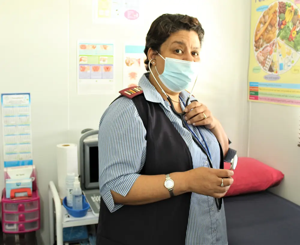 Unjani Clinic Nurse with mask and stetoscope
