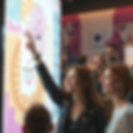 realistic_image_of_visitors_looking_at_an_led_touch_screen3.png