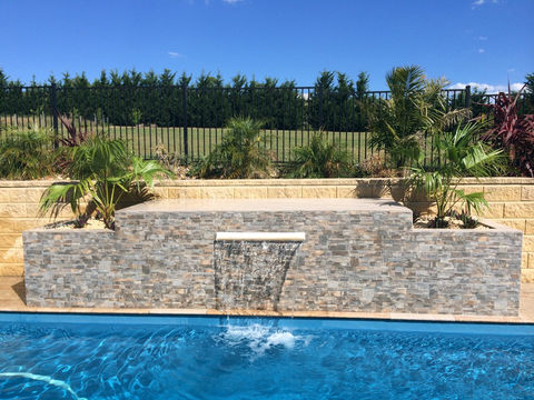 Tiled pool water feature.