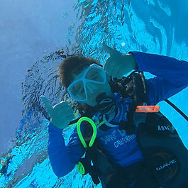 "A beginner diver explores underwater for the first time during a supervised Discover Scuba Diving session in Estonia"