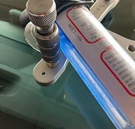 UV light curing windshield chip repair under pressure in Edmond OK