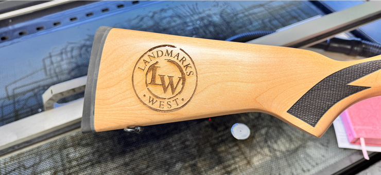 Laser engraver cutting detailed industrial steel