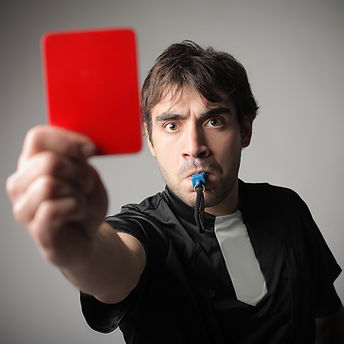 Referee Holding Red Card