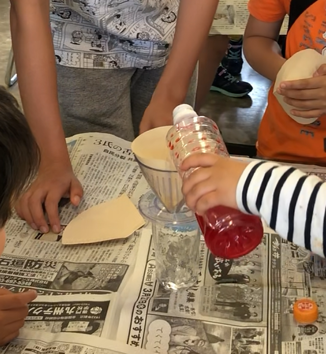 What happens when we filter water with red food coloring? (Red chosen specifically for its dramatic effect).  You guessed it! It stayed red.