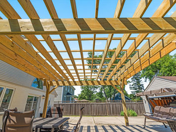 Overall view of TimberTech composite deck with wood pergola in Glenview IL 