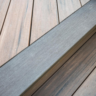 Modern composite deck with black aluminum railing system