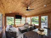 Dry under-deck patio space with drainage system installed