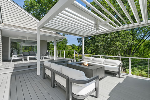 Luxury outdoor deck and Renson pergola designed and built by OnDeck in Long Grove IL
