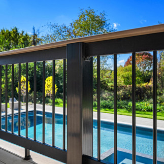 Multiple deck railing systems installed by professional outdoor builders
