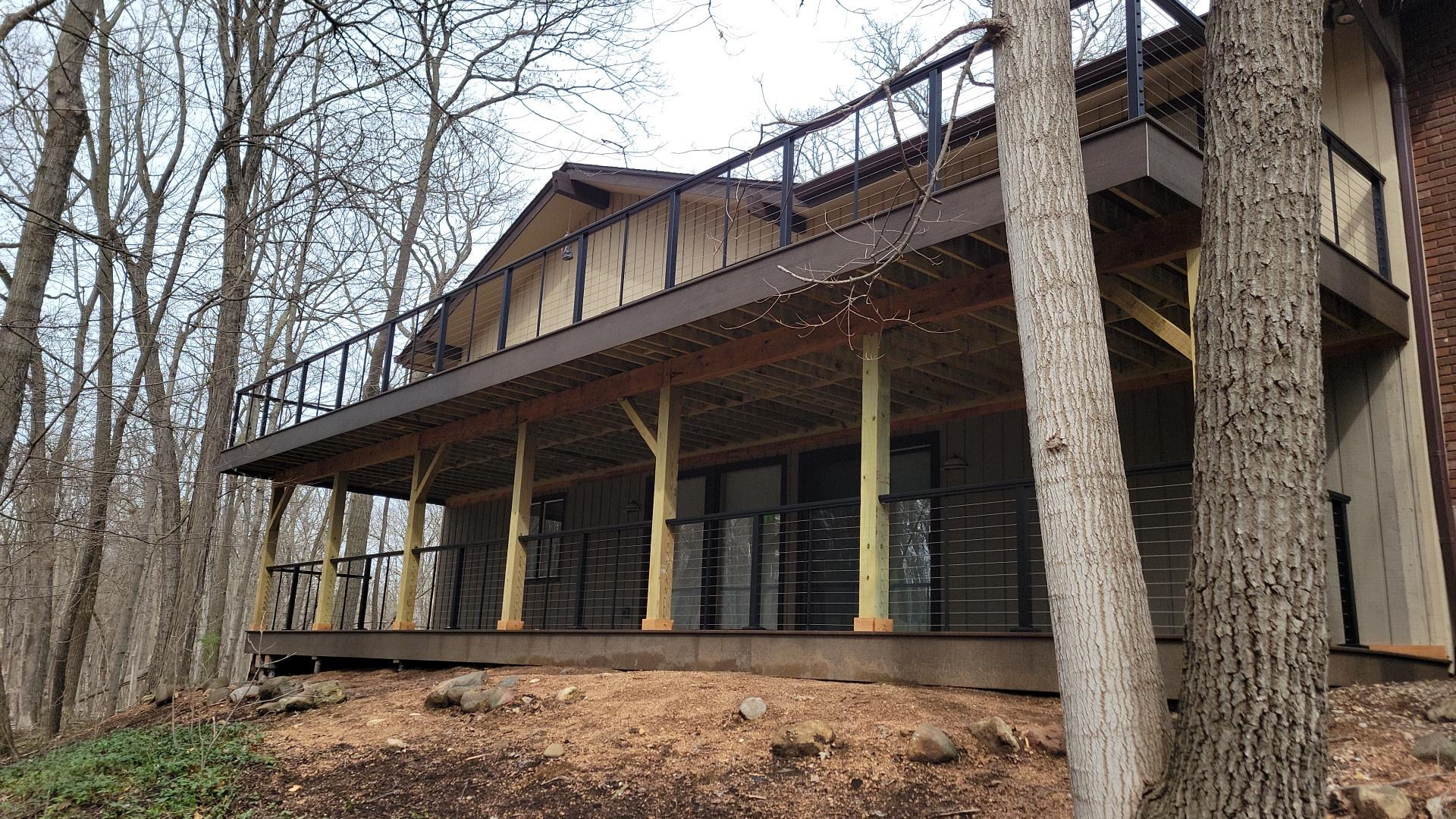 Properly reinforced deck railing post connection