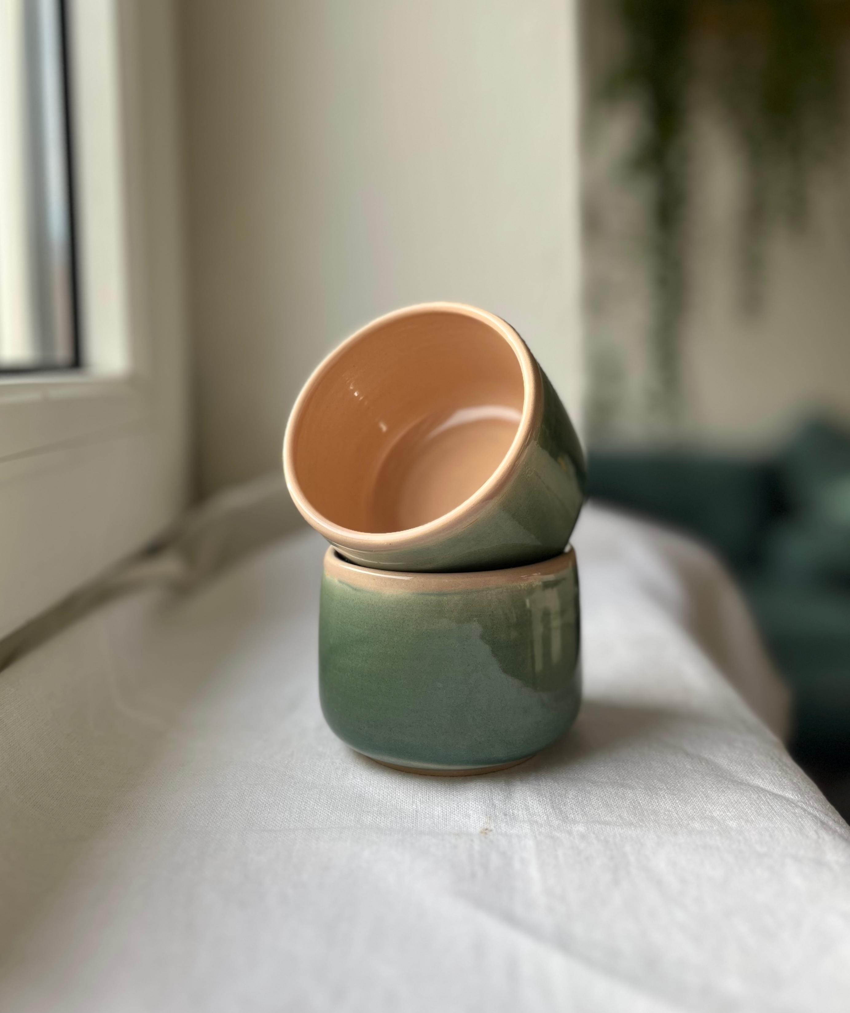 Green and pink cappuccino cup