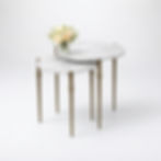 Anthony nesting accent tables in variegated cloud marble with antique brass iron base, studio view