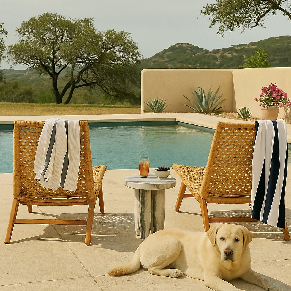 Thumbnail: Atticus panda marble accent table between woven lounge chairs poolside with iced tea, grapes, and labrador