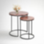Caroline nesting accent tables with variegated fantasy red marble tops and matte black iron base, studio view