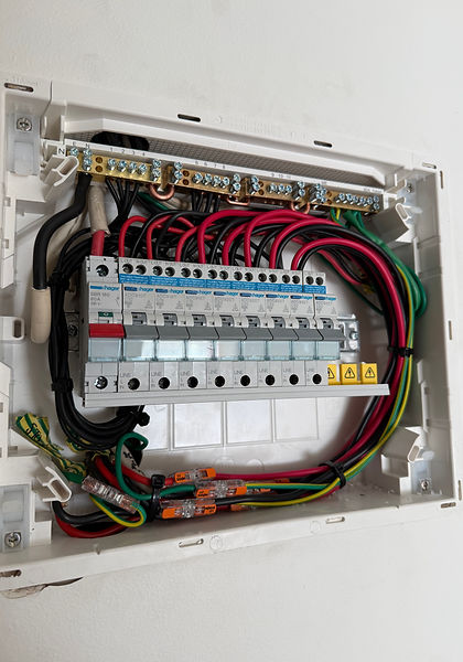 New switchboard being wired with safety switches during an upgrade