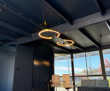 LED feature ring lights in the Aurora Office Furniture showroom in Canberra