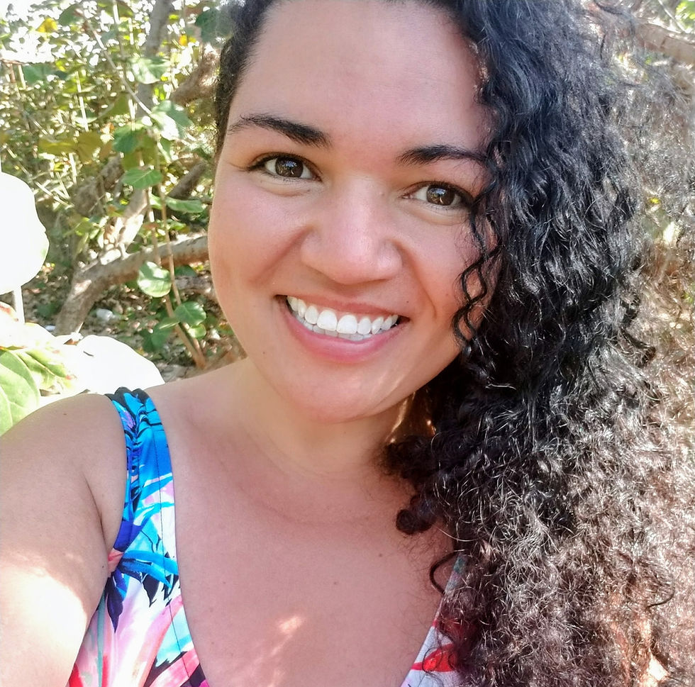 Smiling woman with long curly dark hair