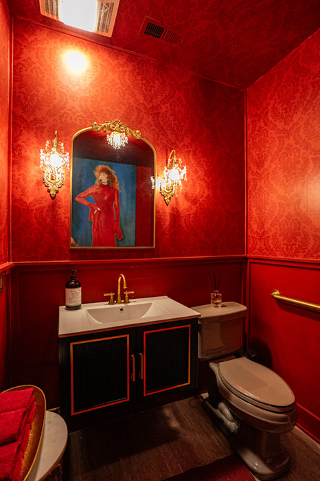 eba McEntire-inspired bathroom at Oxana Salon Hendersonville, blending bold Southern charm with luxury salon design.