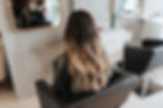 Freshly installed Oxana Hair Extensions styled in soft waves at Oxana Salon chair