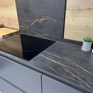 Dekton Laurent worksurfaces on sleek modern handleless kitchen in Sheffield Solid Surfaces Kitchen & Worktop Showroom