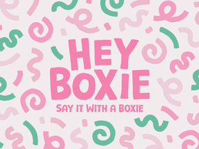 Hey Boxie brand identity featuring bright pink and green confetti-style graphics designed for a joyful letterbox gift brand