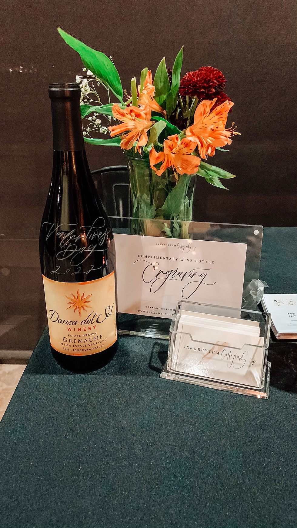 Complimentary engraving sign with engraved wine bottle for Valentine's Day