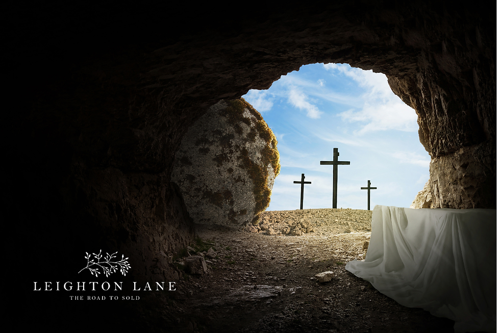View from a dim cave, showing three crosses against a bright blue sky. A white cloth lies on the ground. Text: "Leighton Lane, The Road to Sold".
