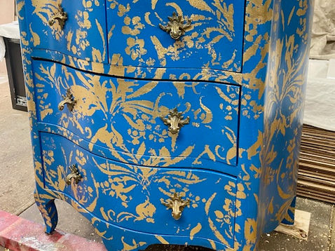 blue with gold painted cupboard