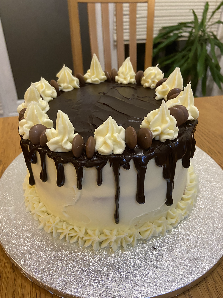 Vanilla birthday cake with strawberry jam & vanilla buttercream filling