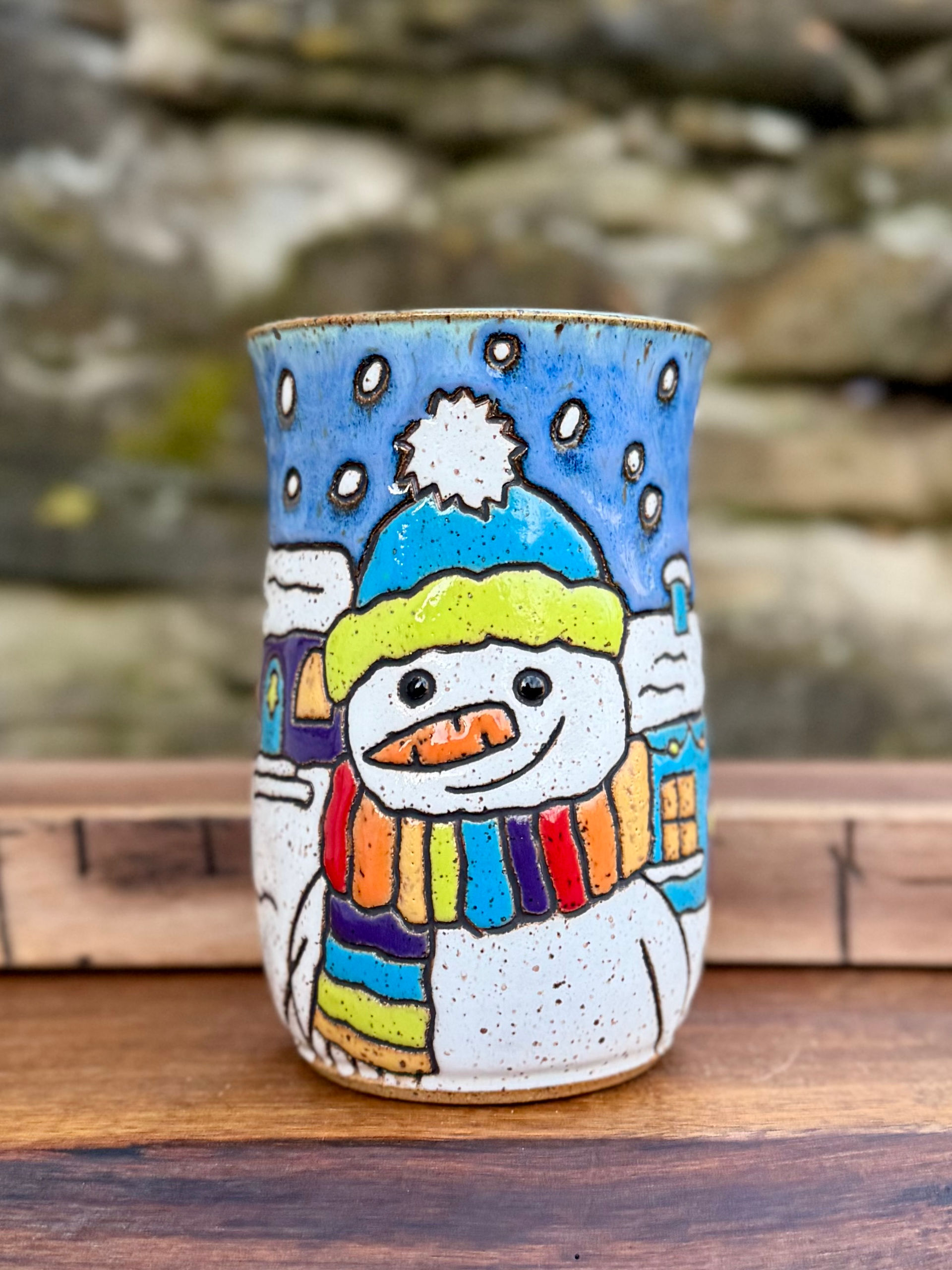 Rainbow Snow Person with Village Mug
