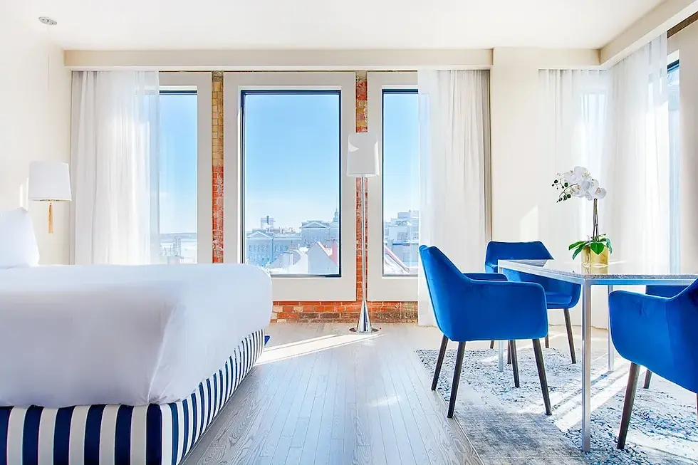 Contemporary boutique hotel room at Monsieur Jean in Old Quebec City