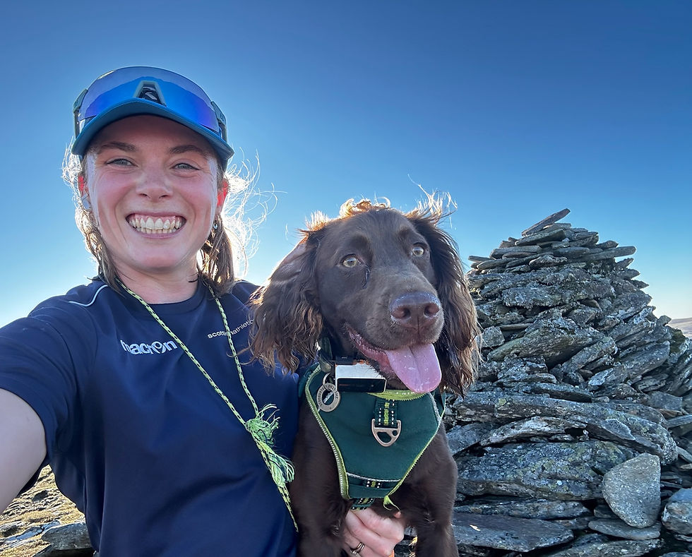 On the summit of A'Chailleach with my dog, Muckle Flugga (who is available for training runs)