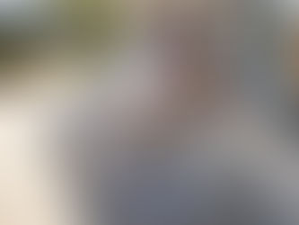 Painter prepares jobsite with insurance papers visible