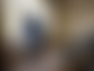 Contractor taping window for lead-safe painting