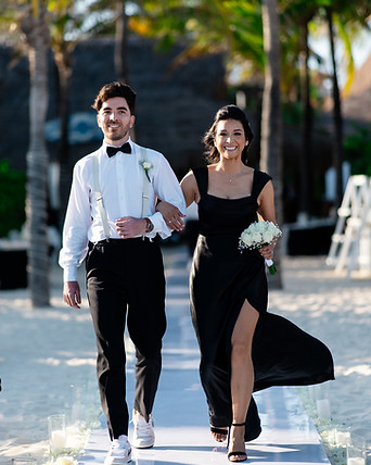 Walking down the aisle captured by OohVow Wedding Photographer and Videographer
