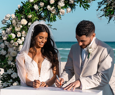 Sand ceremony and signing of the marriage certificate captured by OohVow Wedding Photographer and Videographer