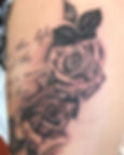 Black and grey roses with script tattoo by Erika Jurkovic